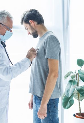 doctor-examining-chest-patient